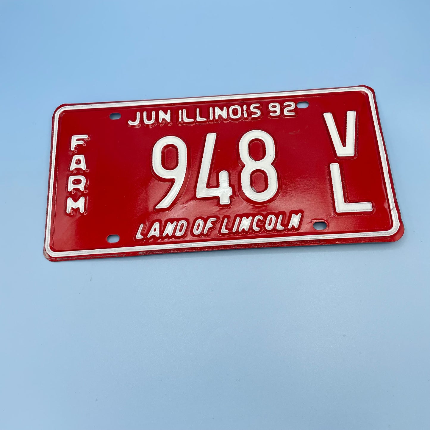 Red Illinois License Plate