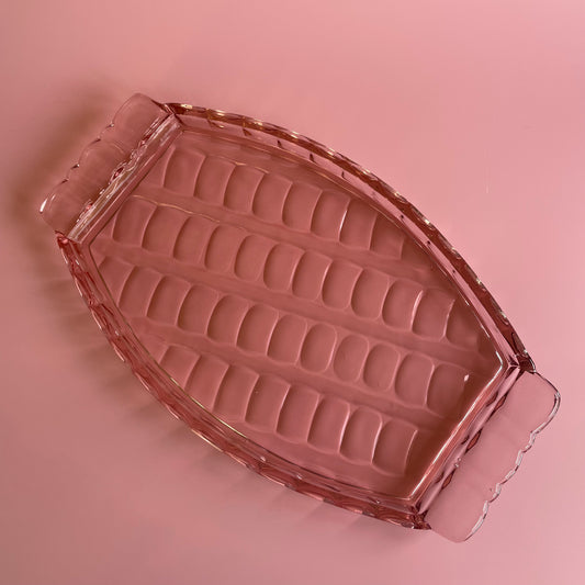 Pink Glass Tray With A Scalloped Pattern