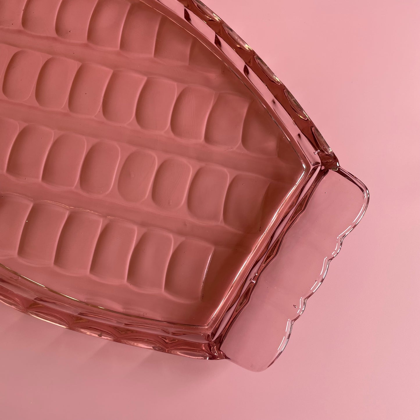 Pink Glass Tray With A Scalloped Pattern